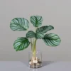 Plante verte artificielle en vase transparent illusion d'eau - 33 cm
