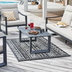 Tapis d'extérieur en polypropylène recyclé noir et crème Ethnique